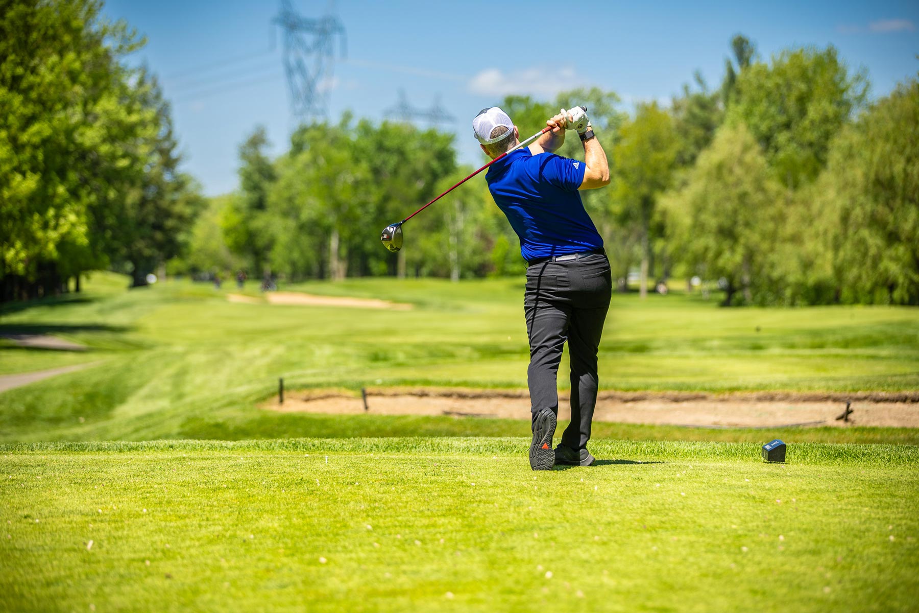 Golfeur de Food Momentum qui représente le tournoi de golf Omnium Metro-Momentum Club de golf le mirage